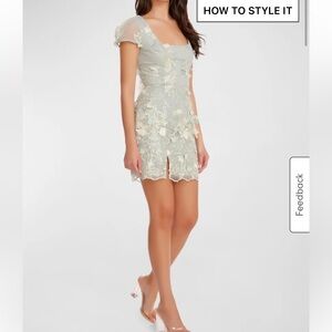 Brand new. Mint color. Never worn. With original tags.
